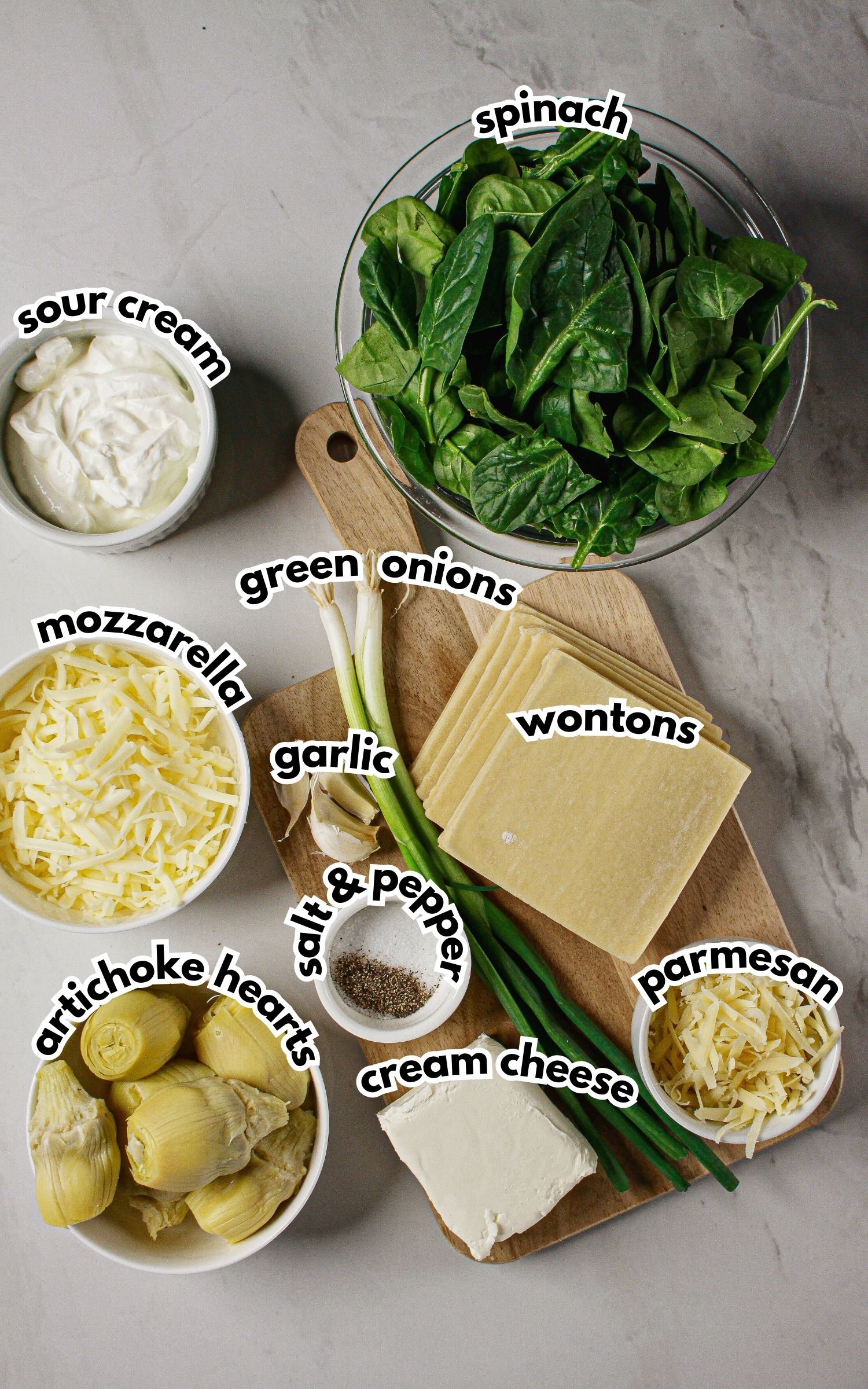 Ingredients on a counter labelled with text.