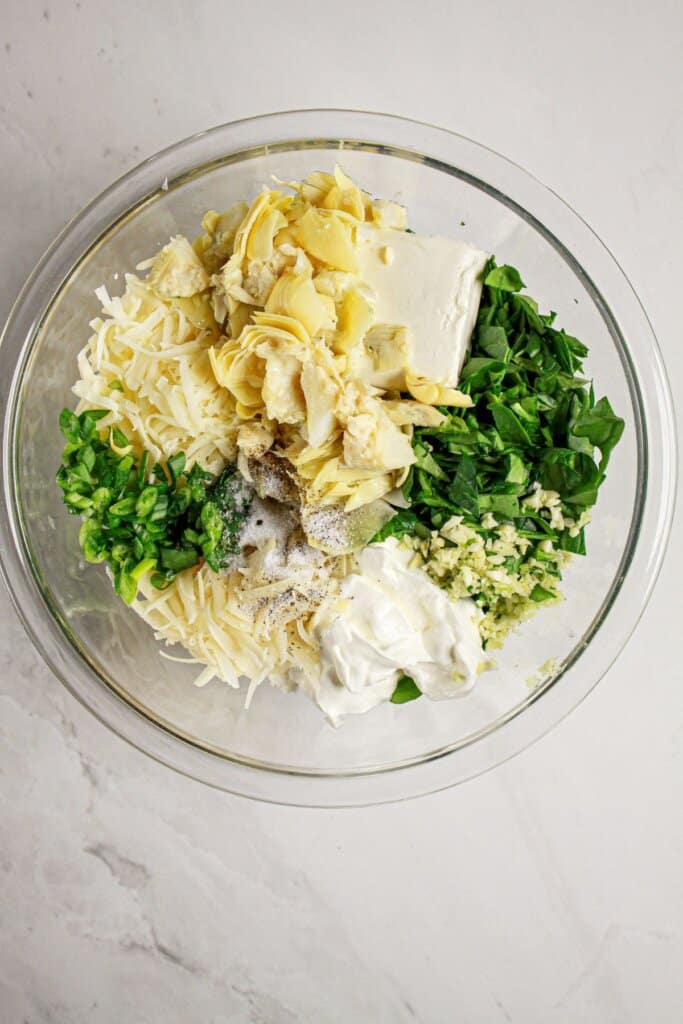 Filling being mixed in a glass bowl.