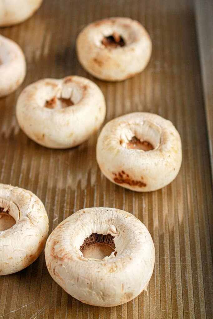 Mushrooms on a baking pan.