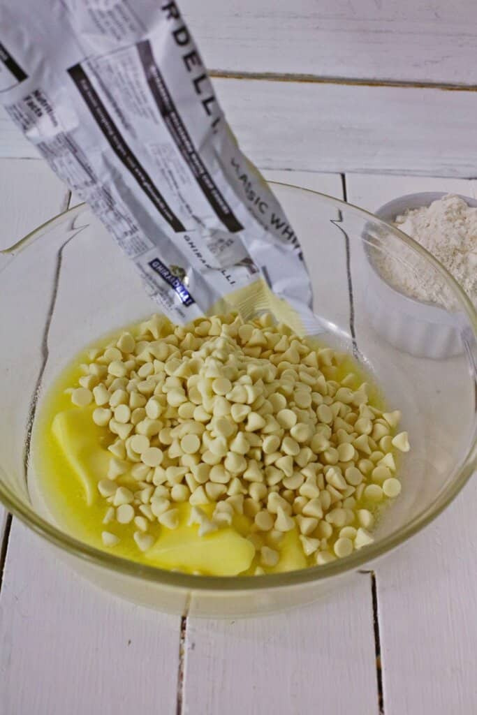 Bowl of butter and white chocolate chips.
