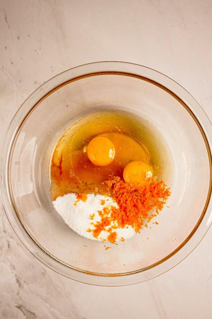 Wet ingredients in a glass mixing bowl.