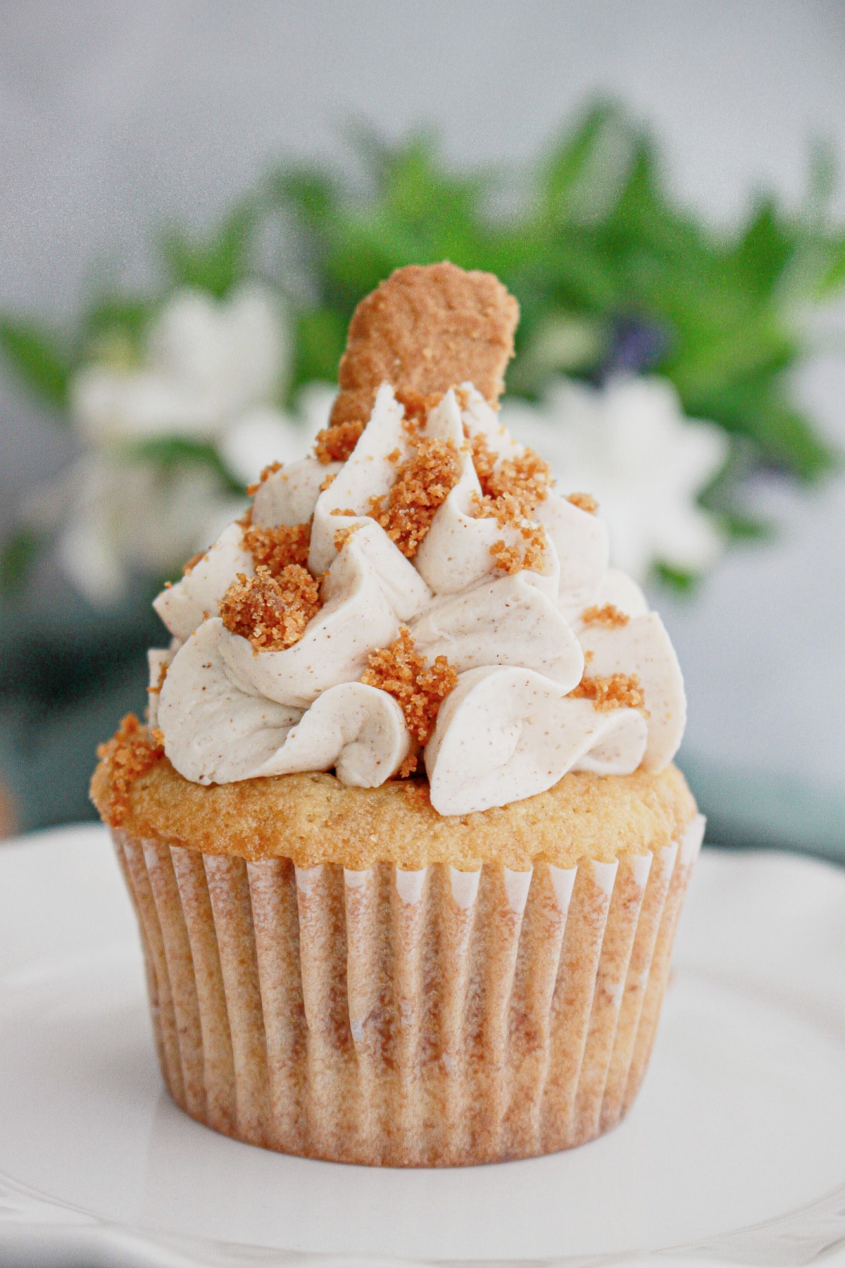 Biscoff cupcakes on a table.
