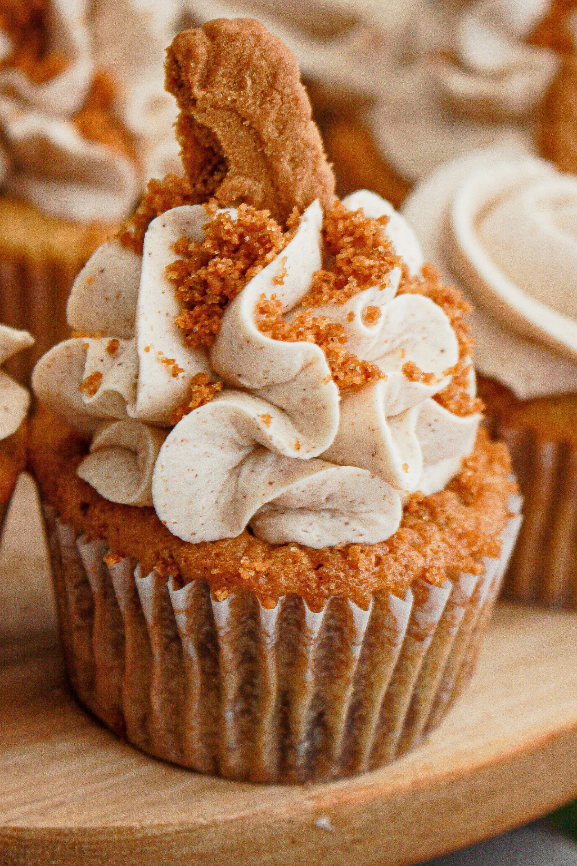 Biscoff cupcakes on a table.