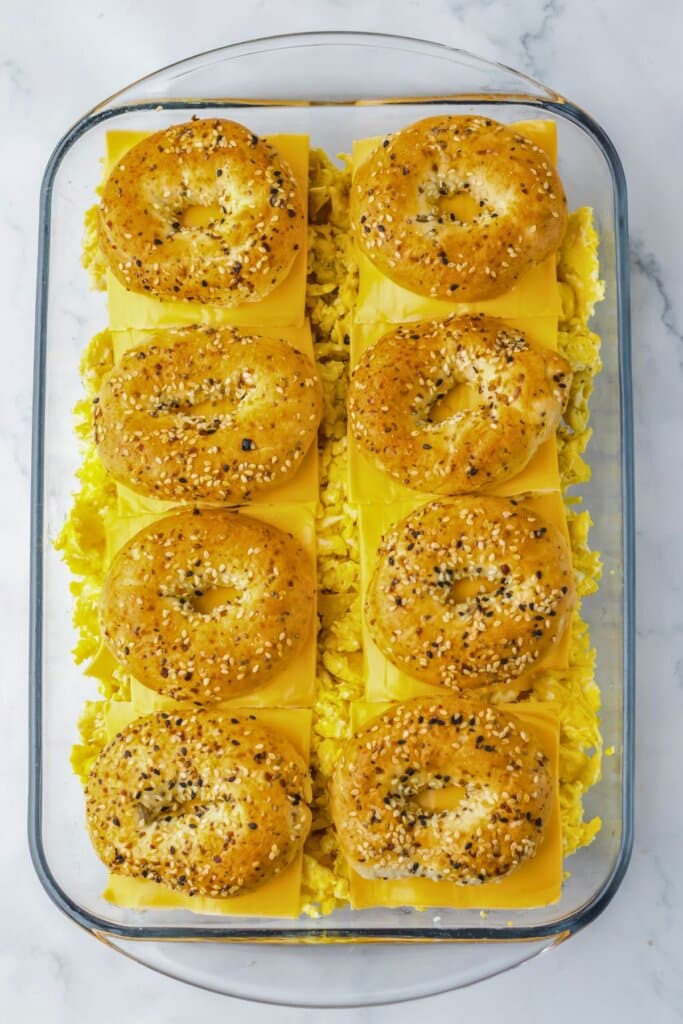 Baked sandwiches in a glass baking dish.