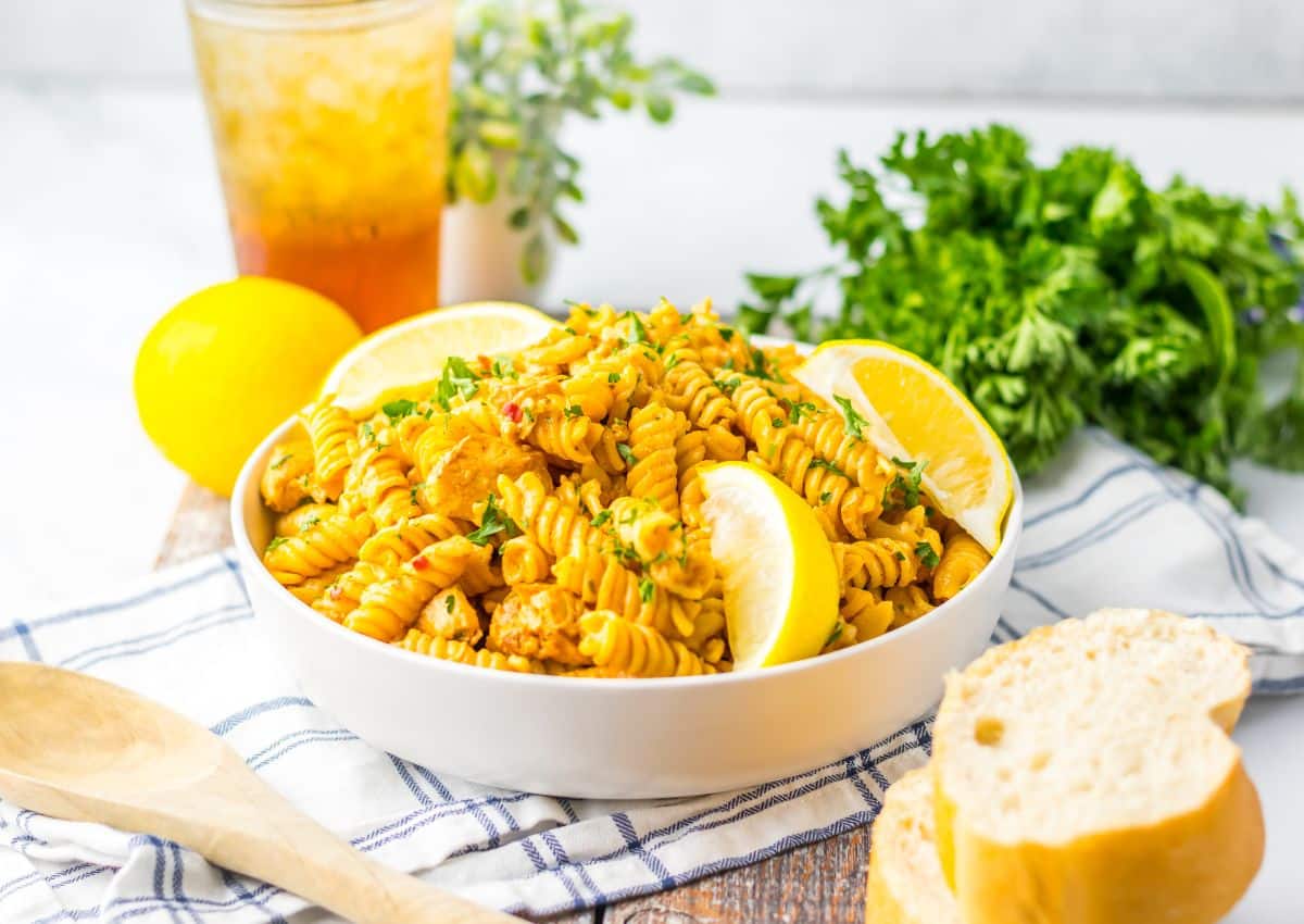 Chicken cowboy butter pasta in a white bowl.