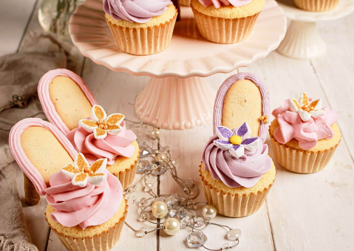 High heel cupcakes on a counter.