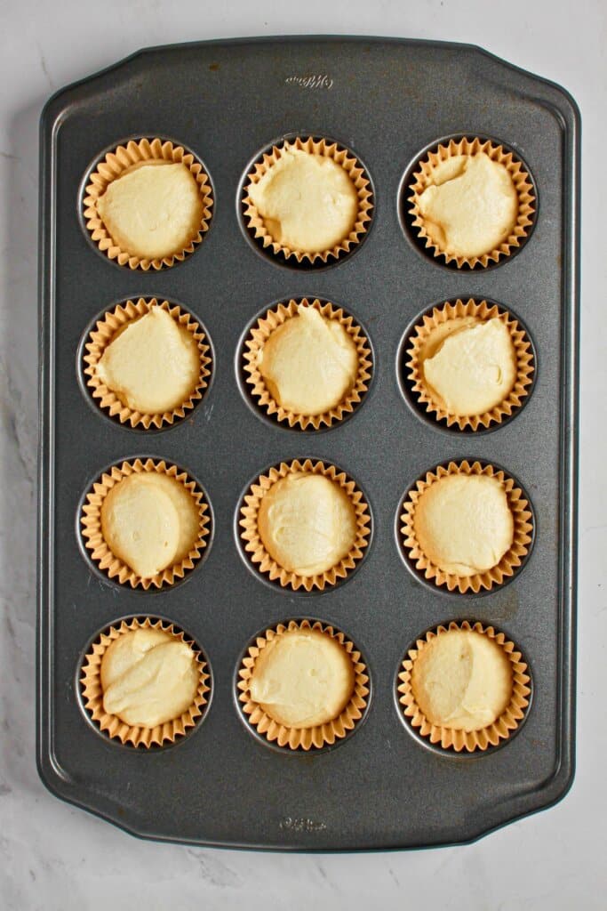 Batter in a muffin pan ready for the oven.