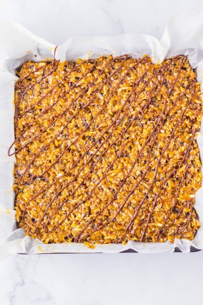 Finished dessert in a parchment lined baking pan.