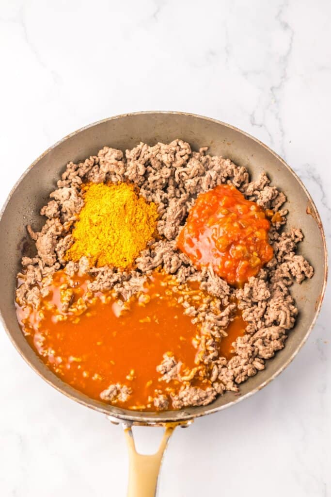Beef, salsa and seasonings in a large skillet.