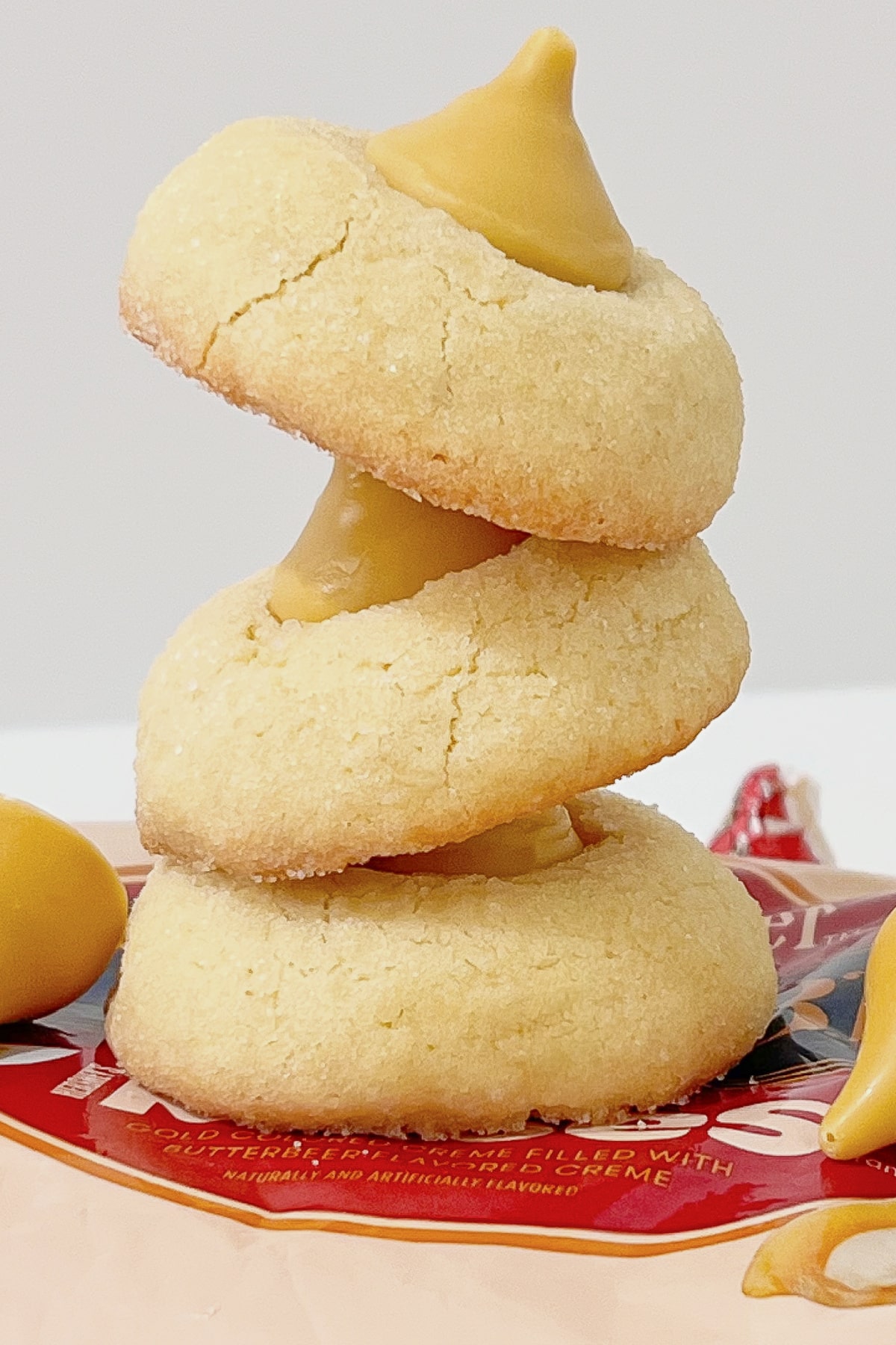 Butterbeer blossom cookies stacked on top of each other.