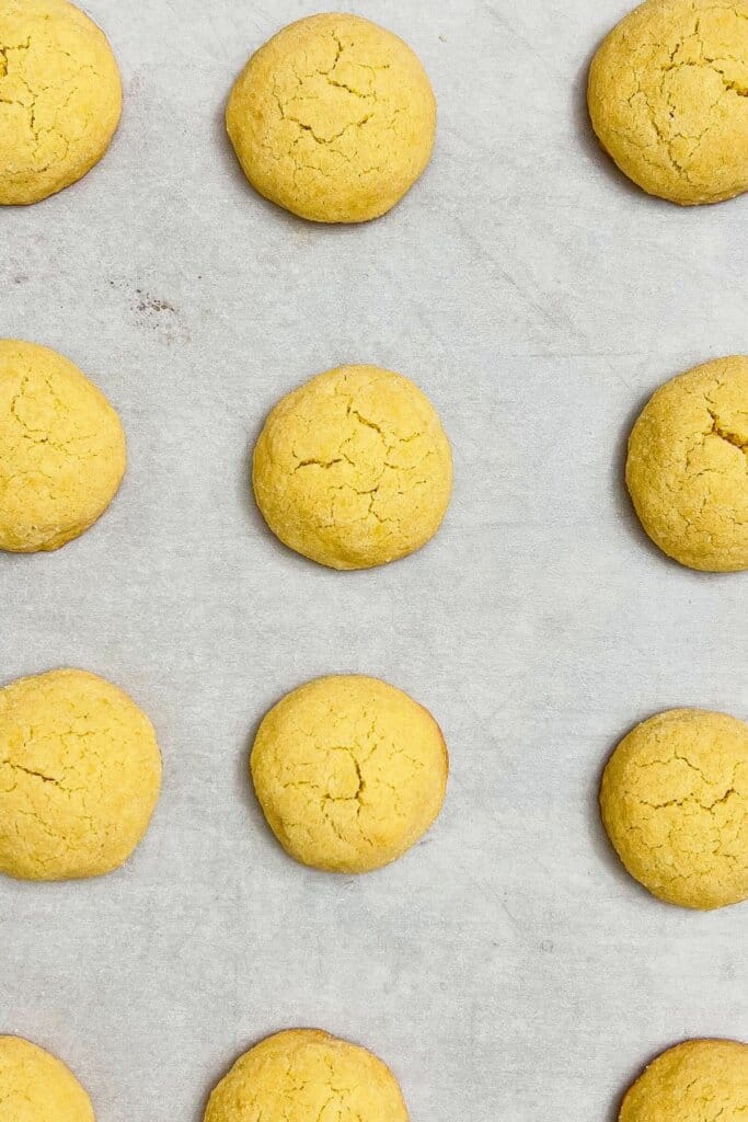 Cookies cooling on a baking sheet.