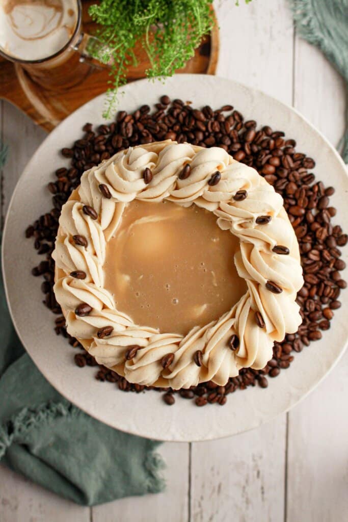 Frosted cake on a cake plate.