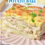 Slice of cheesy chicken potato bake on a pink plate.