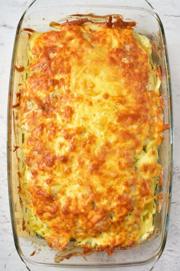 Casserole dish filled with savory food chilling.
