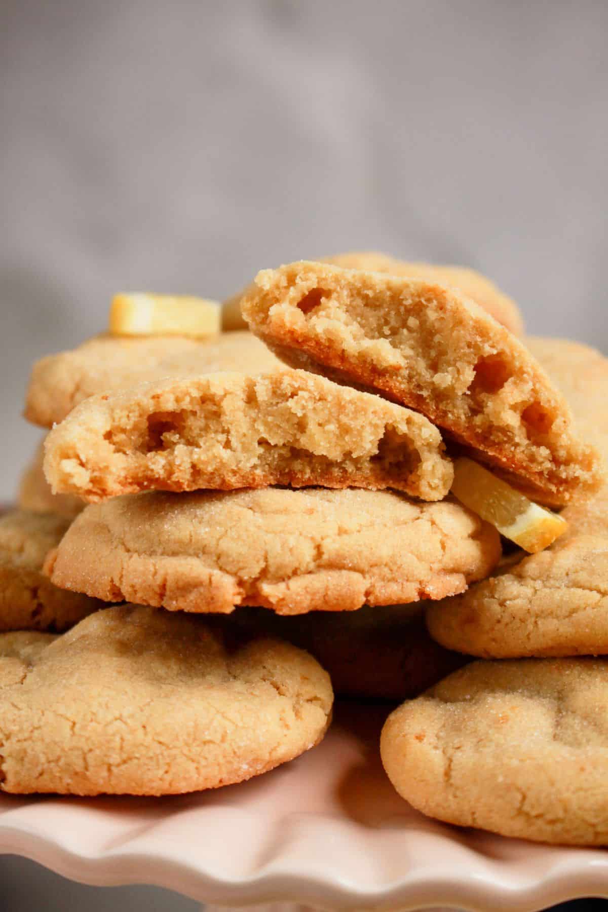 Cookies being stacked on a platter.