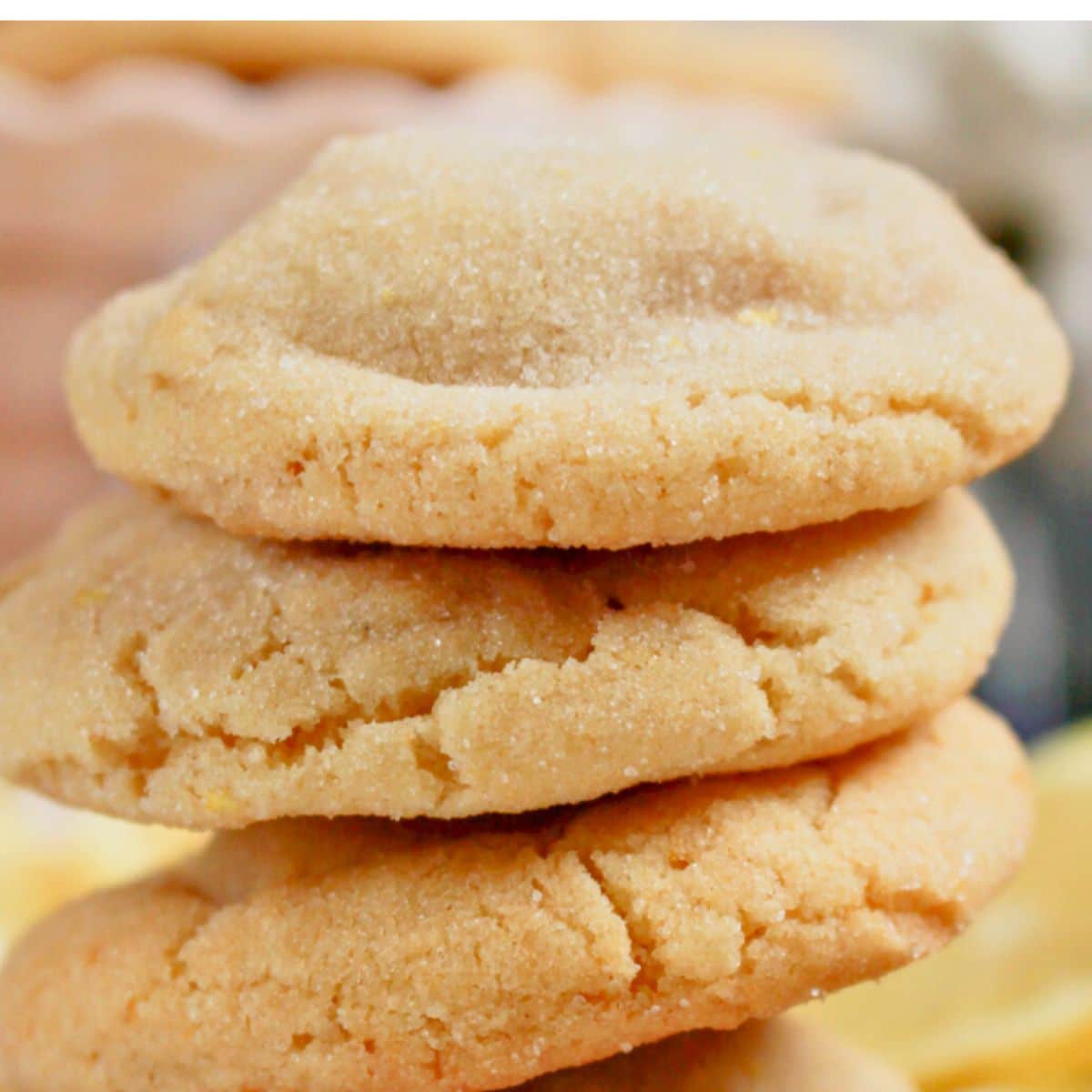 Two chewy cookies stacked on top of each other.