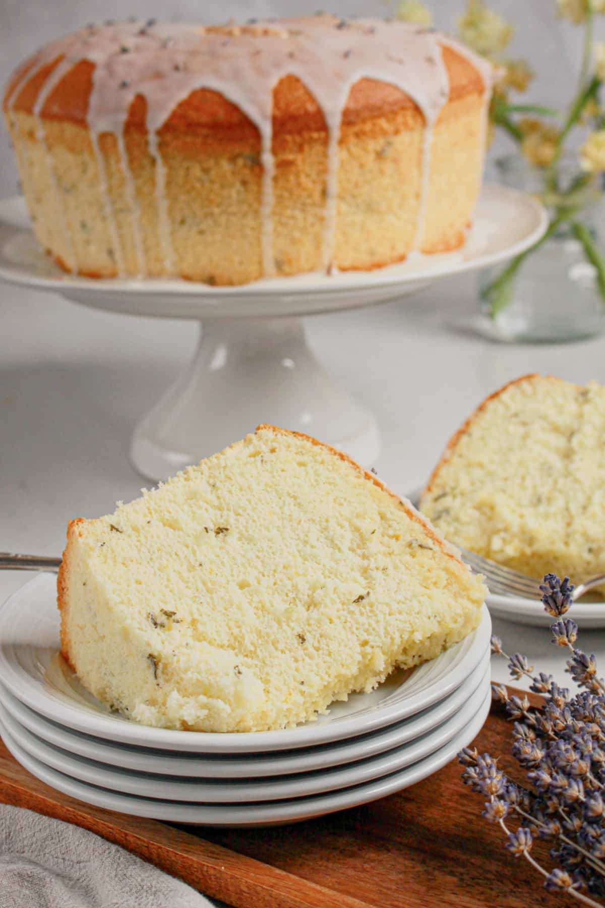 Slice of lemon chiffon cake on a small plate.