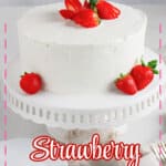 Strawberry Shortcake Cake on a cake stand.
