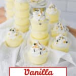 Vanilla pudding shots on a white napkin.
