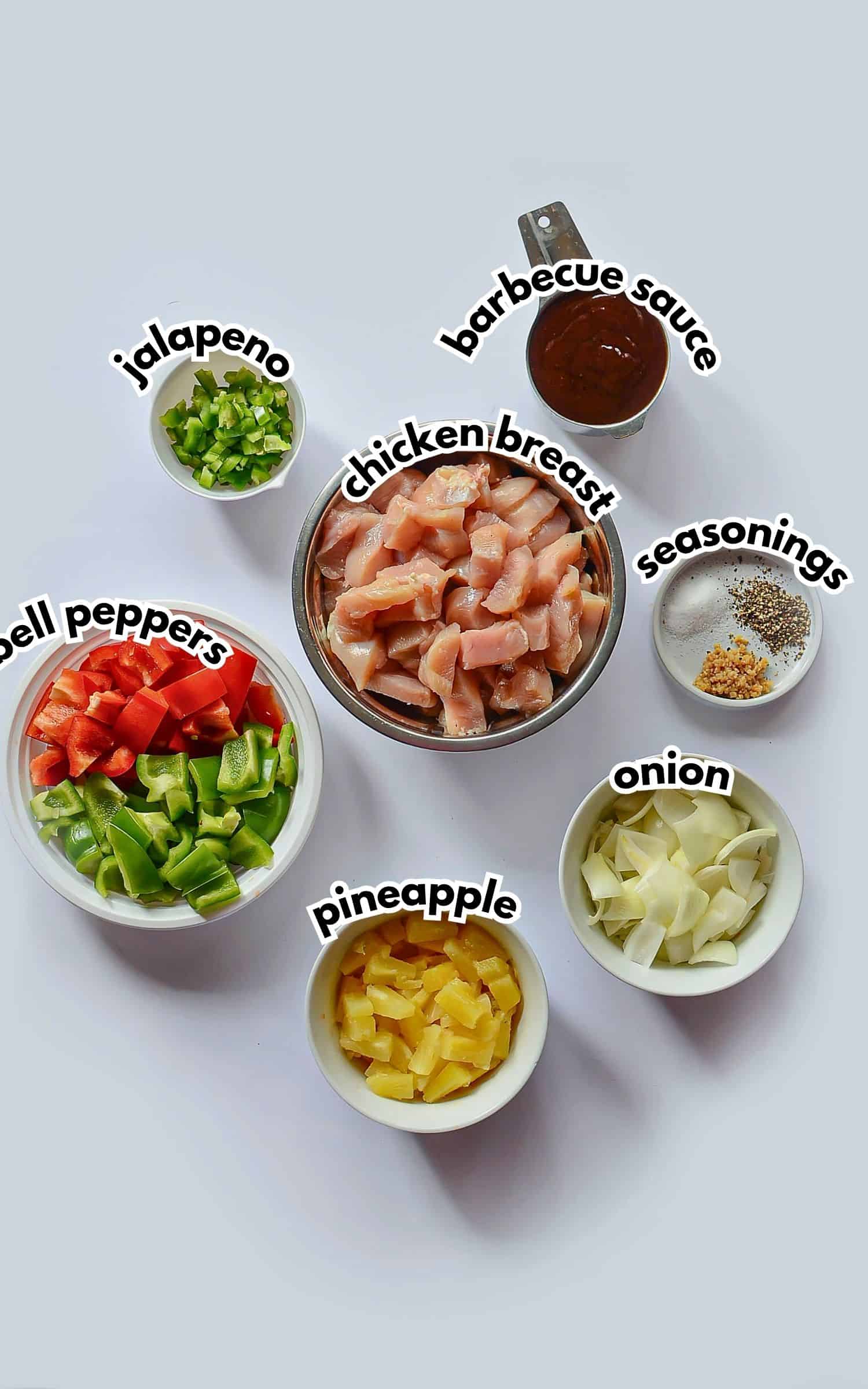 Bowls of ingredients labelled with text.