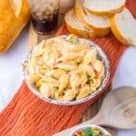 Copycat Panera Broccoli Mac and Cheese White bowl full of broccoli mac and cheese.