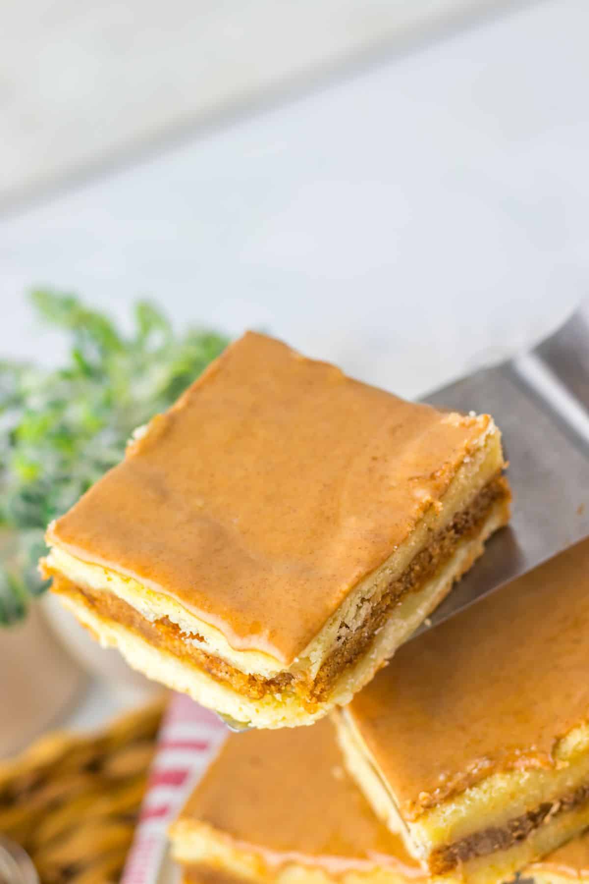 Brown butter cinnamon bar on a spatula.