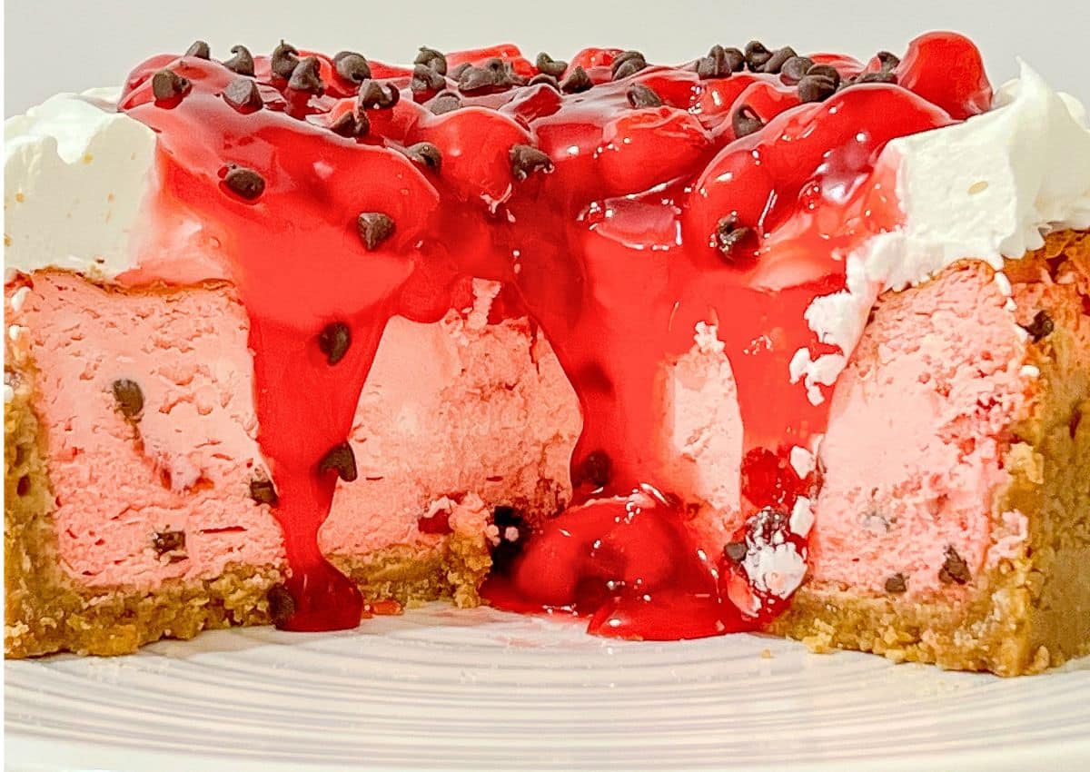 Cheesecake with slice missing.