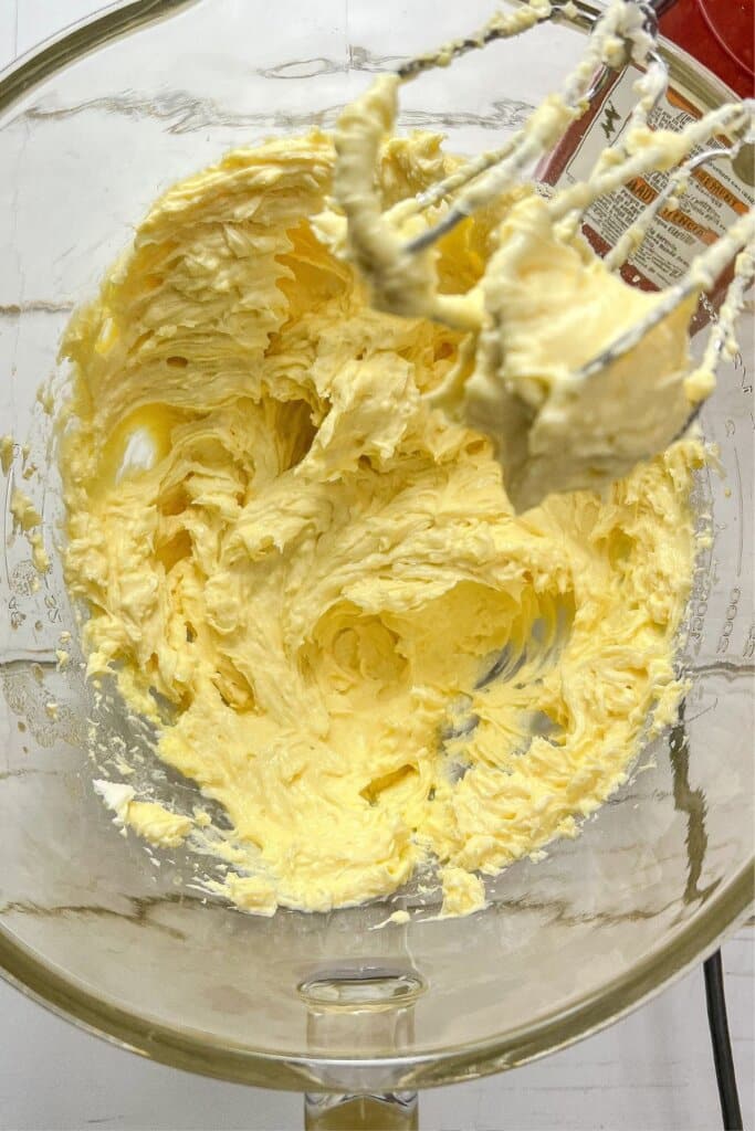 Batter being mixed in a mixing bowl.