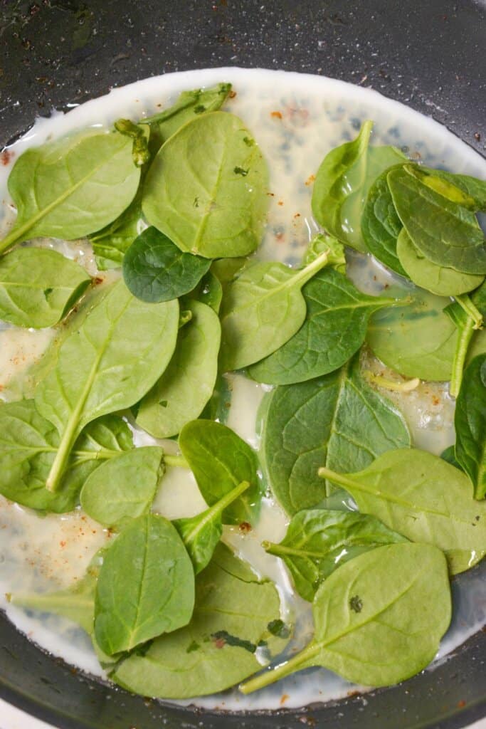 Spinach in a skillet.
