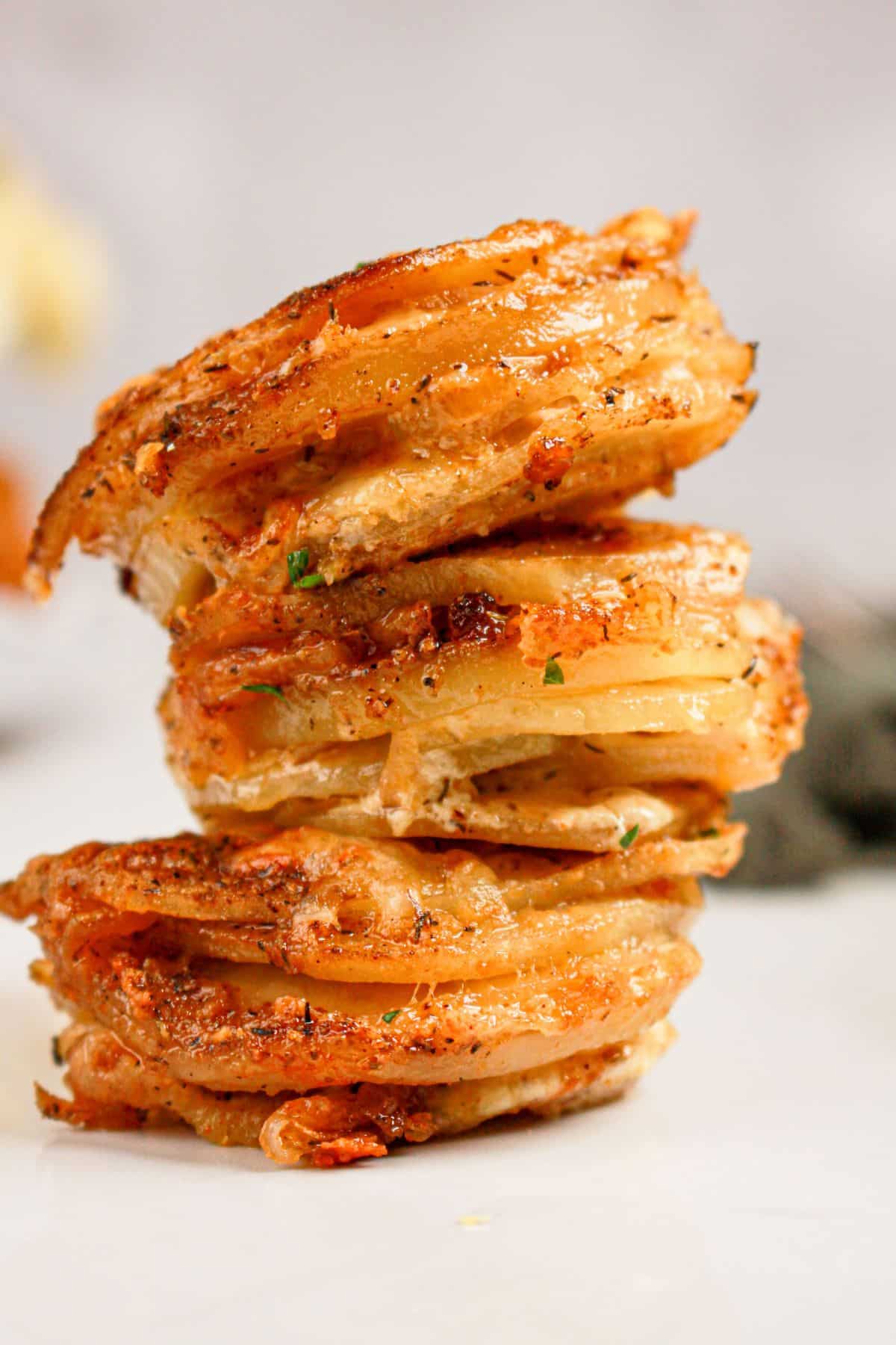 Three potato stacks on a counter.