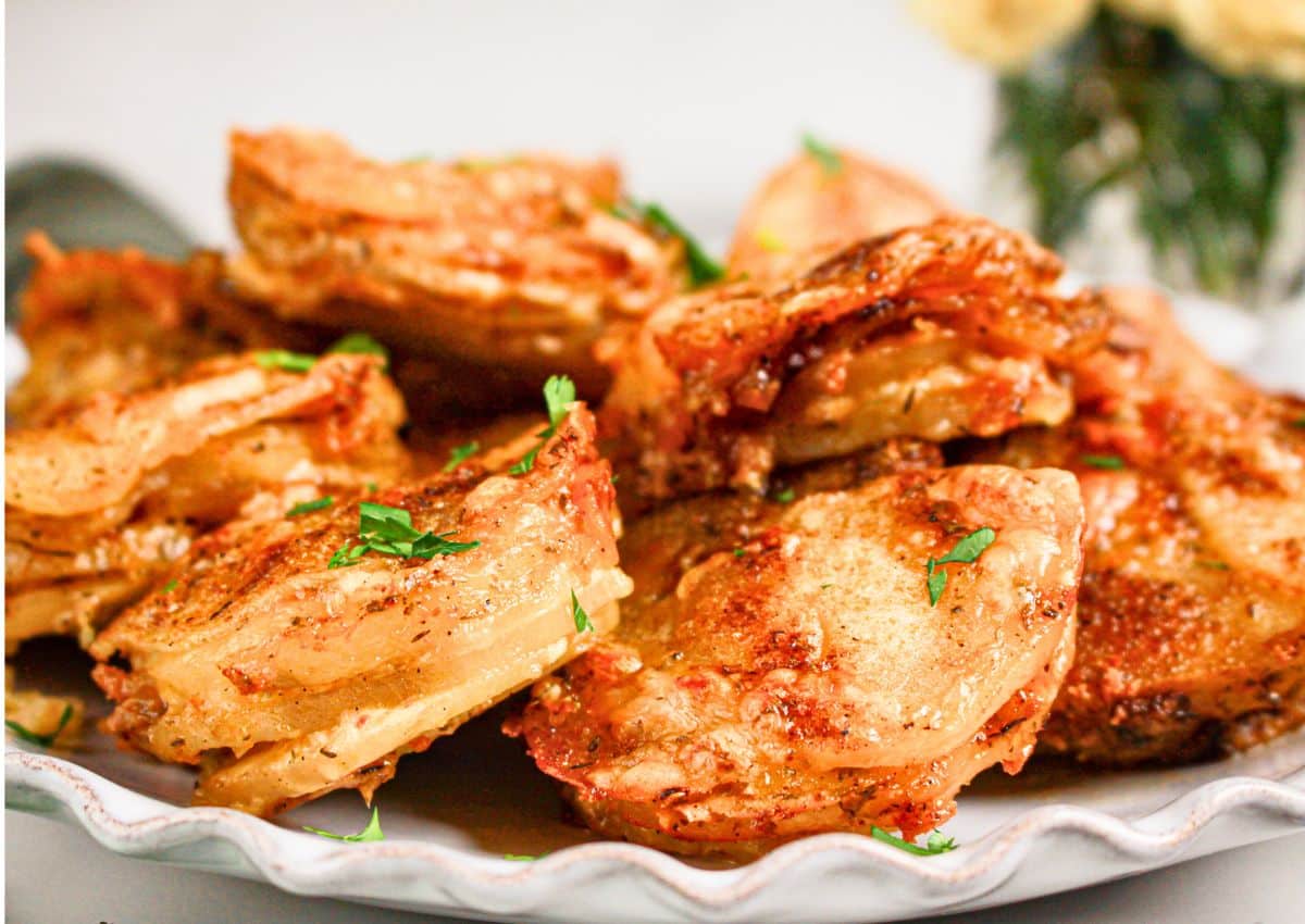Muffin Tin Potatoes on a scalloped plate.