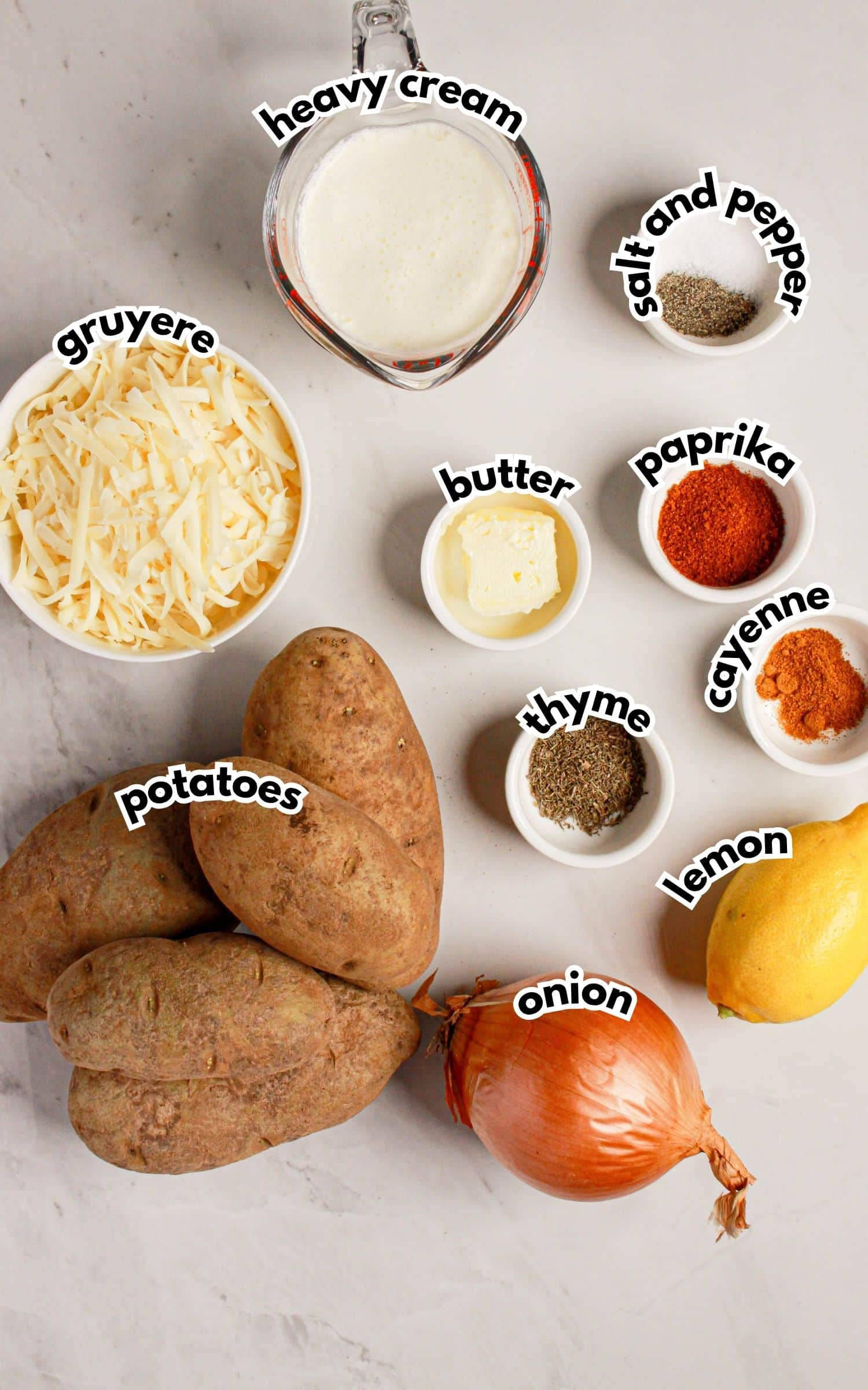 Ingredients labelled with text on a counter.