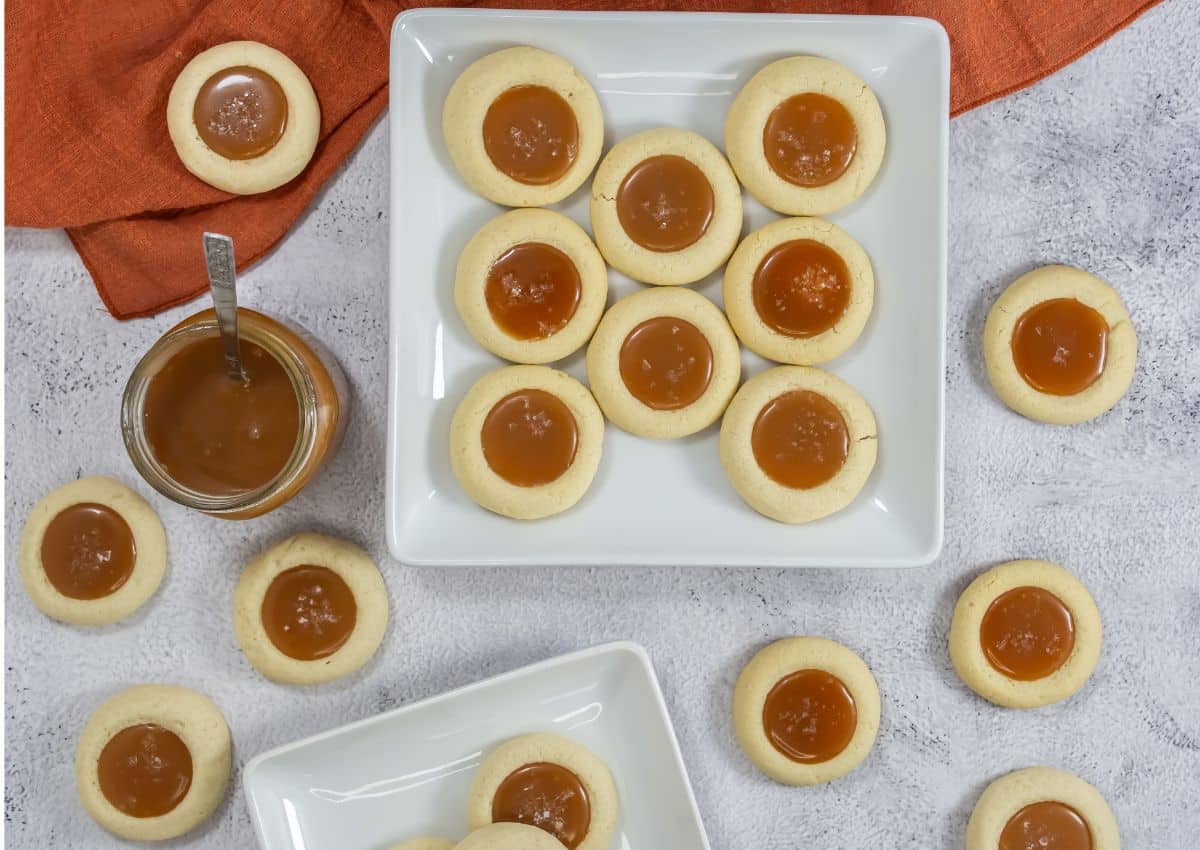 Salted caramel cookies on a white plate.