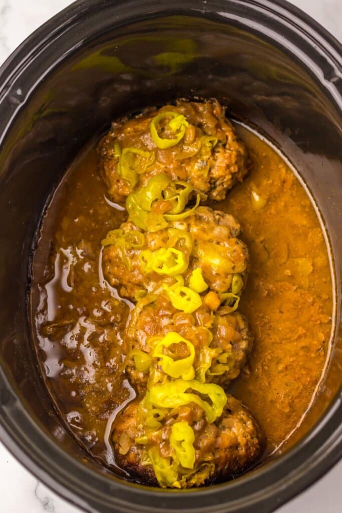 Meat cooking in Crock Pot.