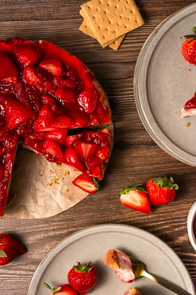 Top of view cheesecake with a slice missing