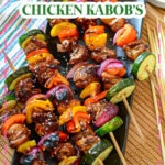 Asian chicken kabobs on a serving platter.