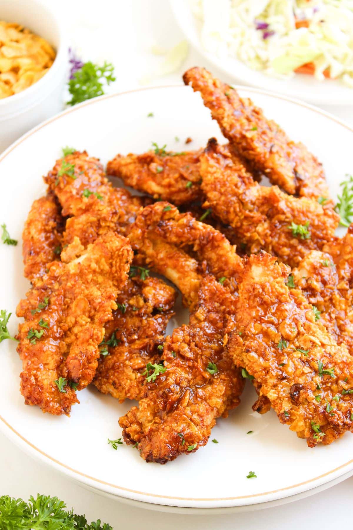 BBQ chicken tenders on a plate.