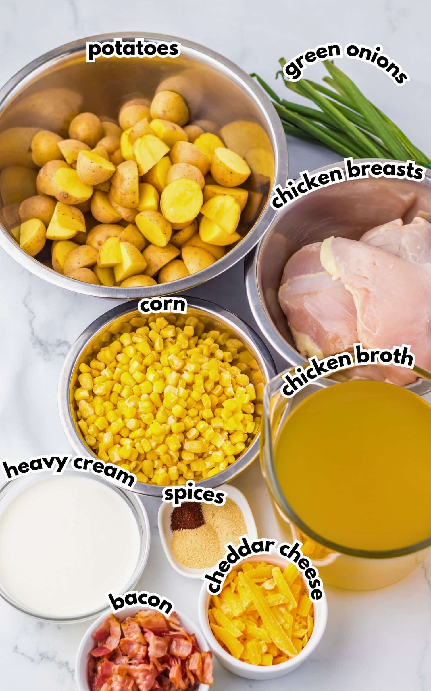 Bowls of ingredients labelled with text ready to cook.