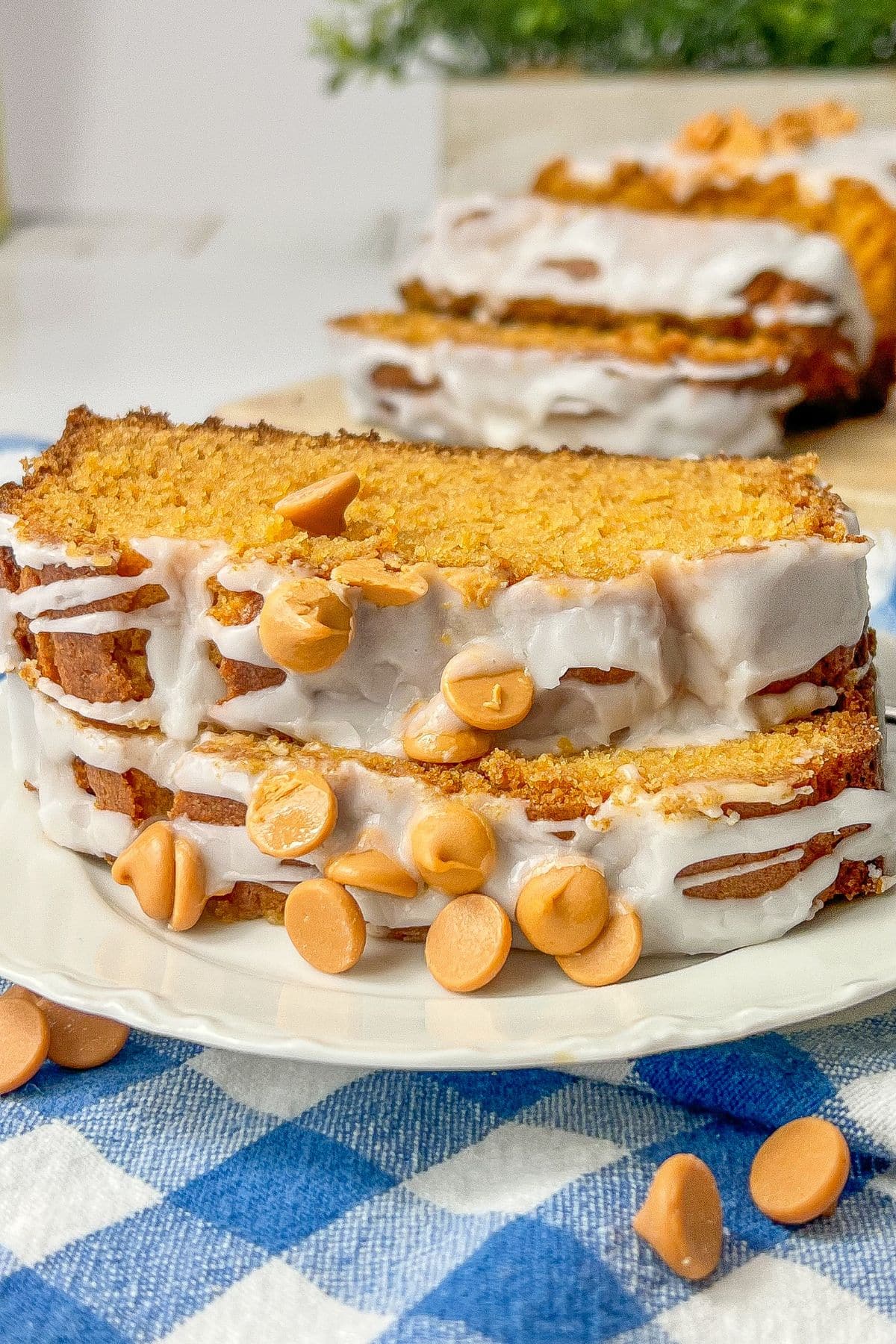 Two slices of butterscotch bread on a small white plate.
