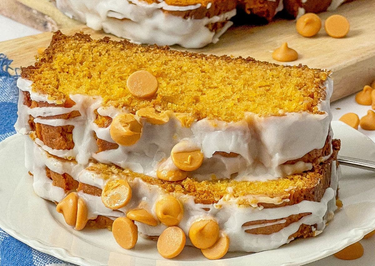 Two slices of butterscotch bread on a small white plate.