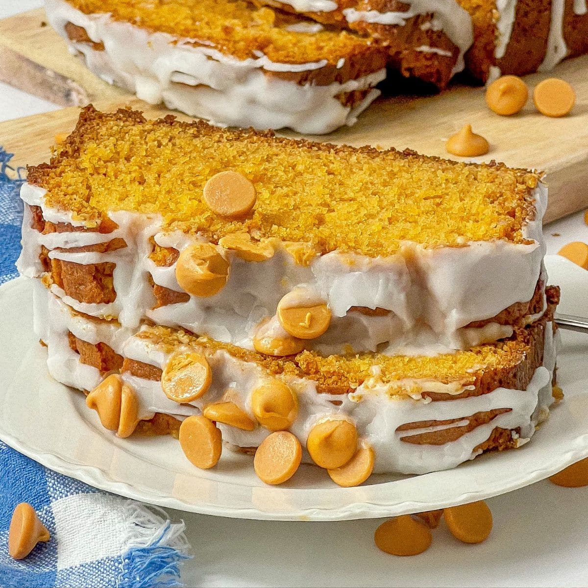 Two slices of butterscotch bread on a small white plate.