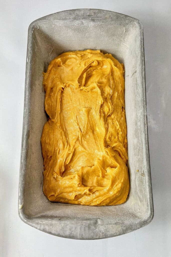 Batter in a metal baking dish.