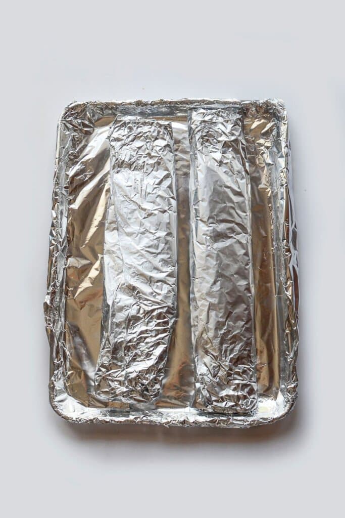 Meat wrapped in foil ready for the oven.