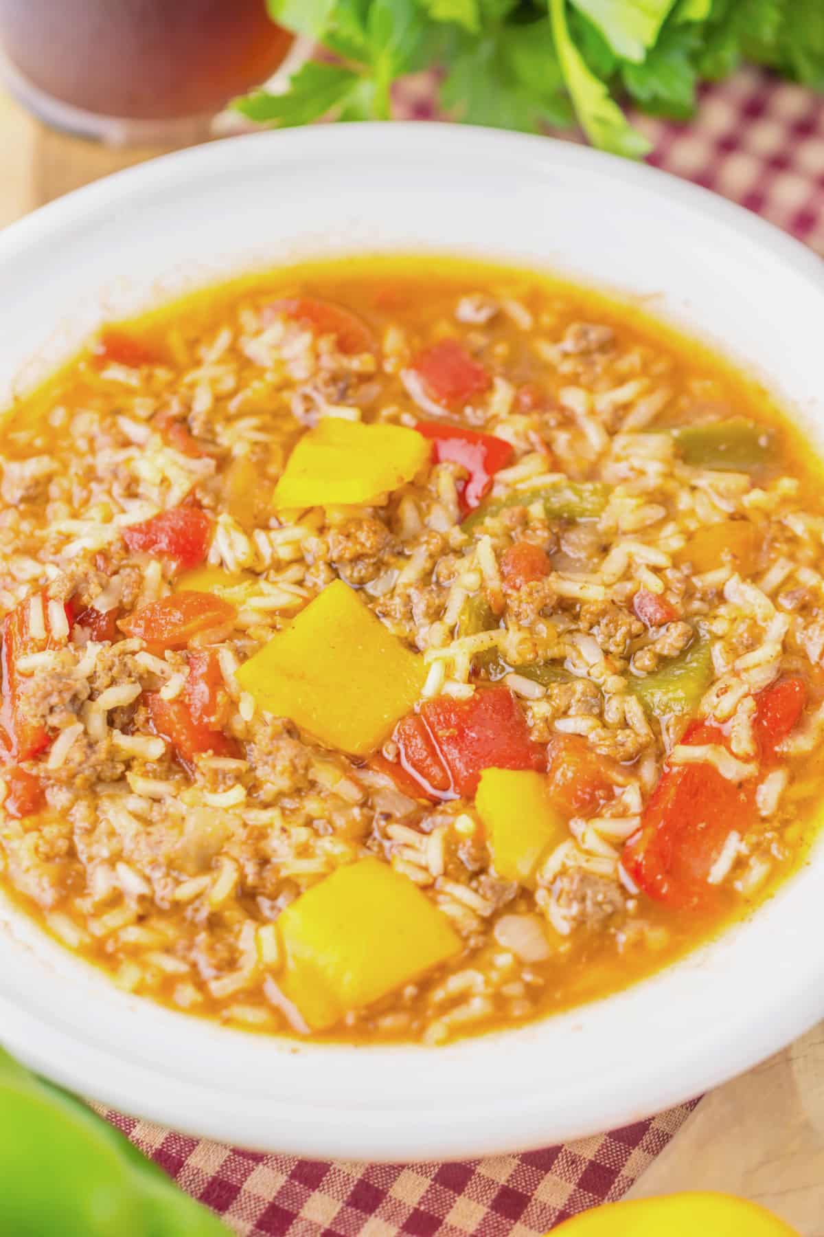 White bowl full of stuffed pepper soup.