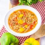 White bowl full of stuffed pepper soup.