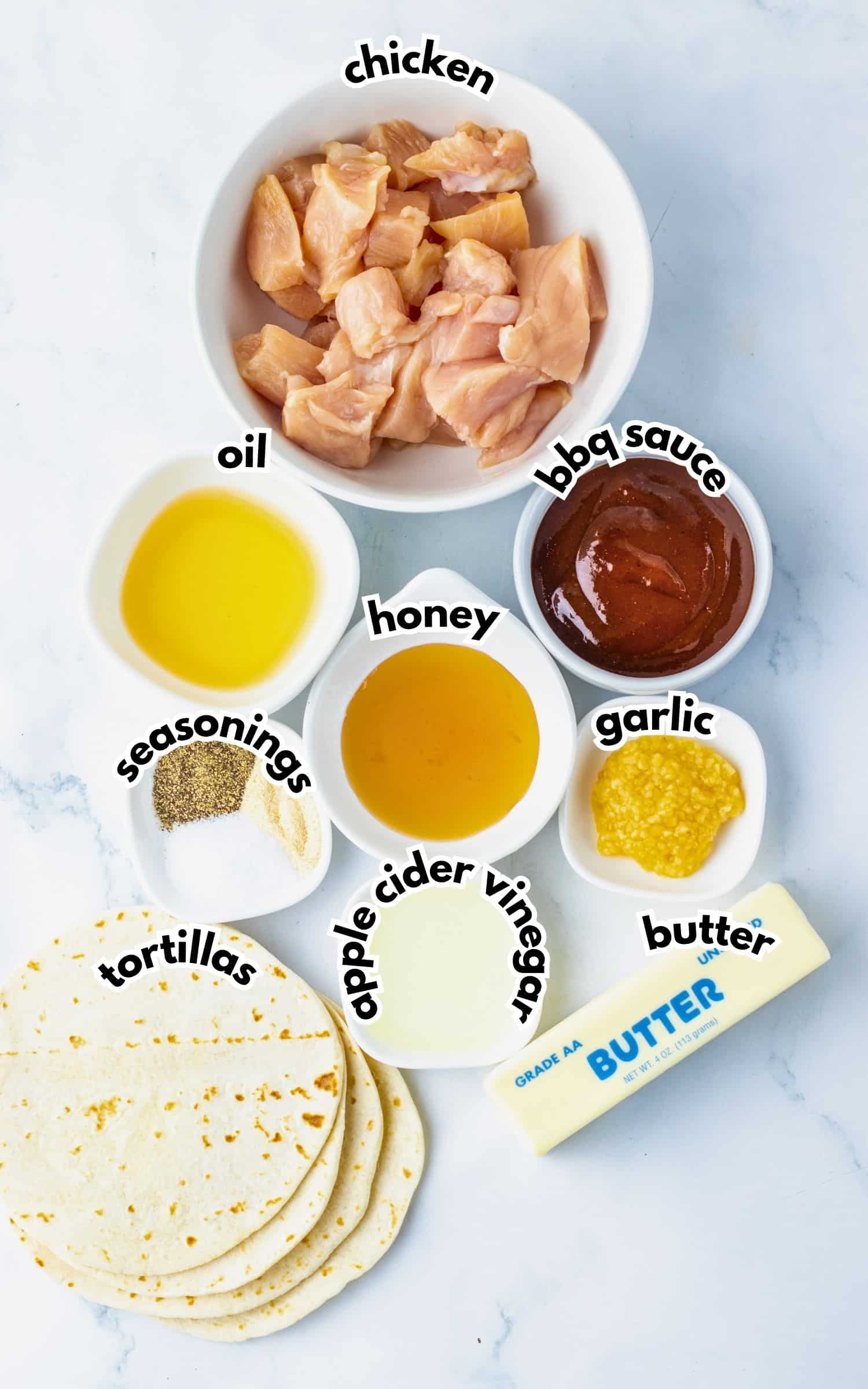Bowls of ingredients labelled with text.