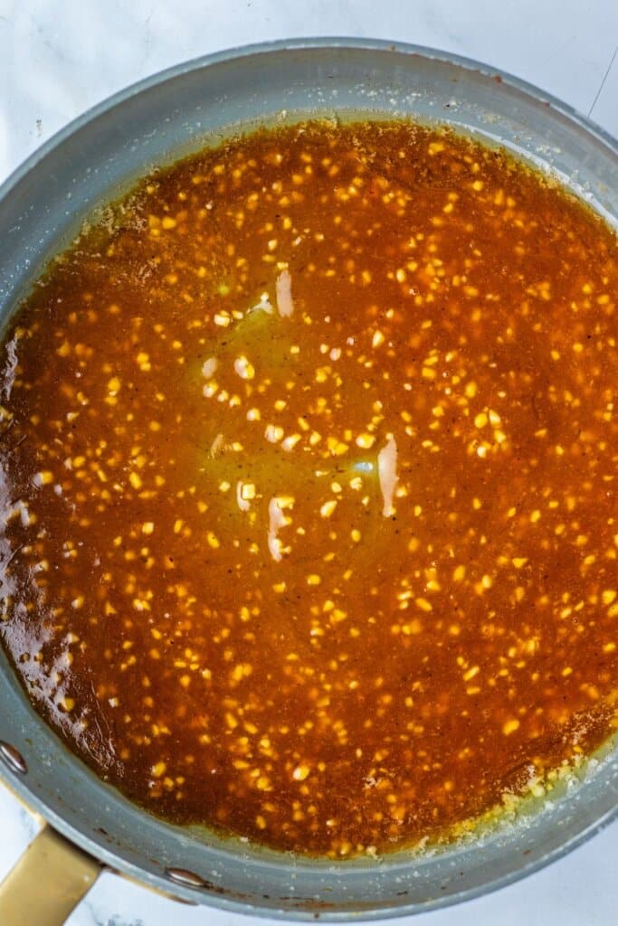 Sauce being cooked in a skillet.