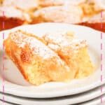 Slice of gooey butter coffee cake on a small plate.