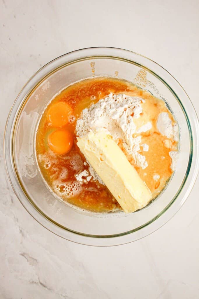 Butter filling ingredients being mixed in a glass bowl.