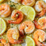 Lemon garlic butter shrimp in a skillet.
